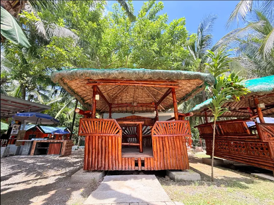 A welcoming bamboo cottage gathering space at Starksway Resort